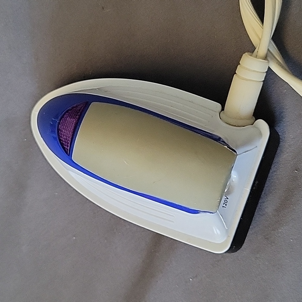 Traveling iron